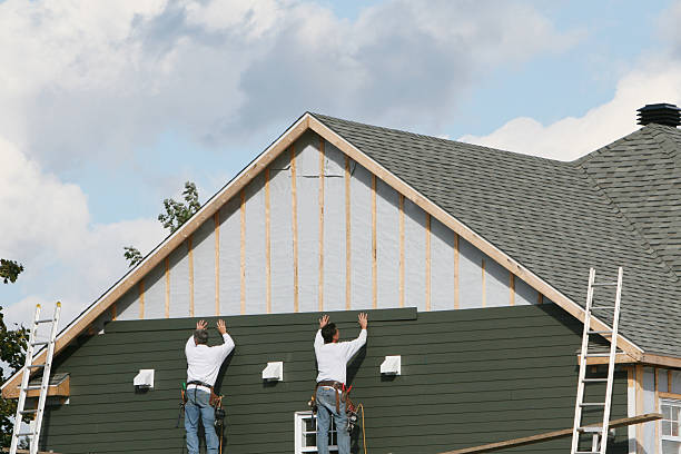 Professional Storm Damage Siding Repair technician working in Springfield, MA